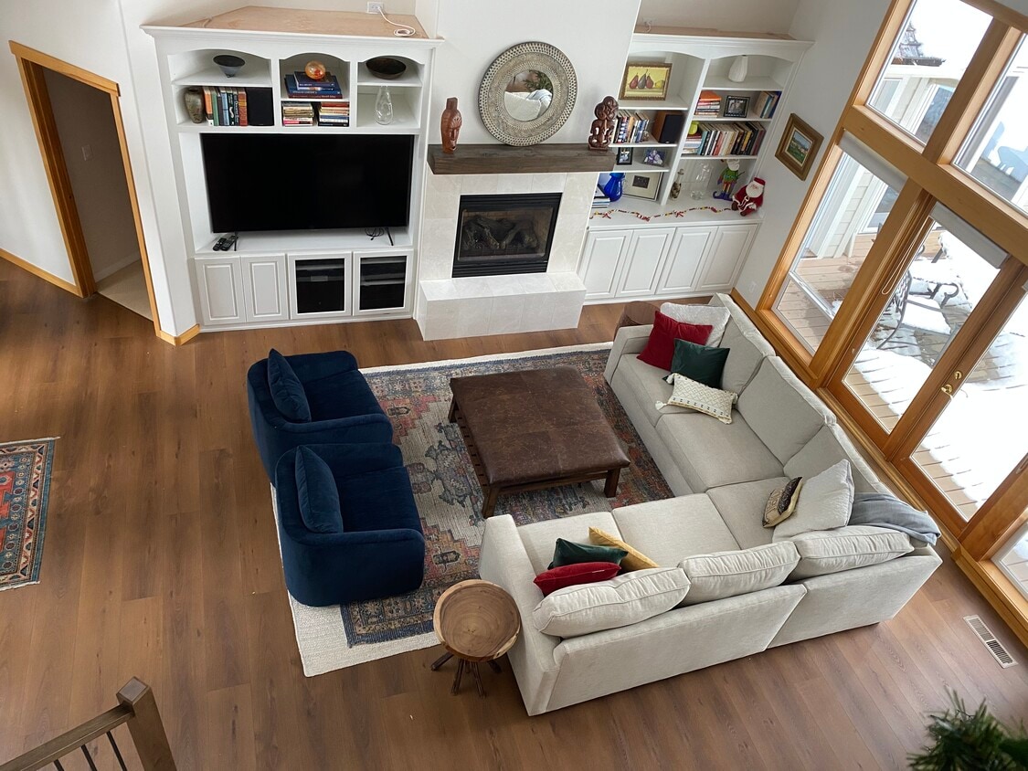 view of living room from upstairs landing - 60709 Golf Village Loop