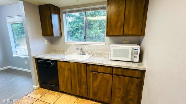 Building Photo - 2 br, 2 bath Triplex - 8954 Rancho Grande ...