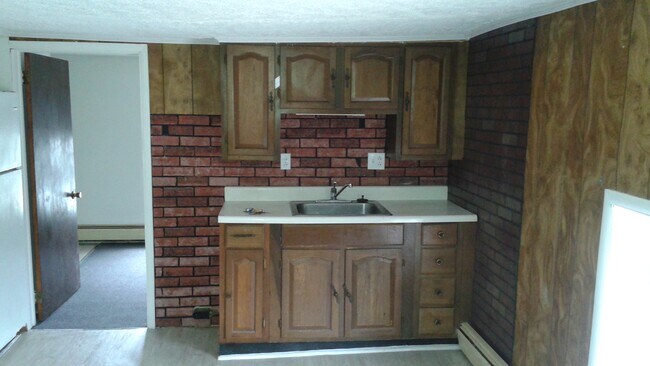 Kitchenette (apartment sized stove has been isntalled) - 1 Heuvelton St