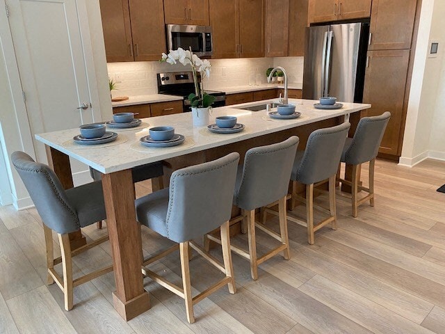 A kitchen for entertaining - Highlands at Aero Park Apartments & Townhomes 55+