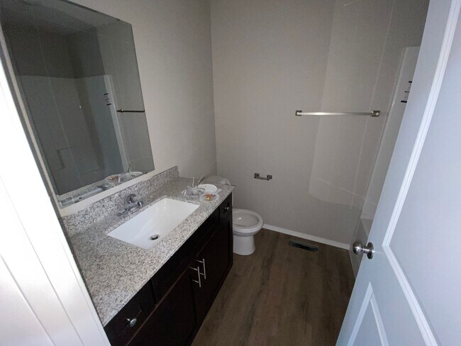 Building Photo - Comfortable four-bedroom home.
