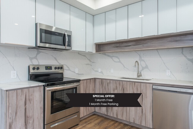 Building Photo - Indigo 141: NEW Boutique Collection of Units