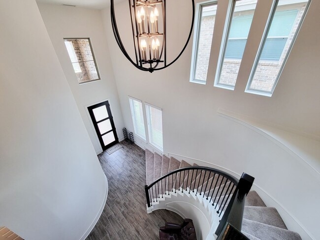 Building Photo - Two story. 4 bedrooms. 2.5 baths. Spacious island kitchen open to Family room and dining room. Pr...