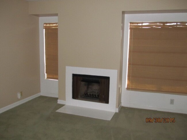 Building Photo - LOVELY 2 BR/1.5 BATH, 2 STORY CONDO WITH GARAGE