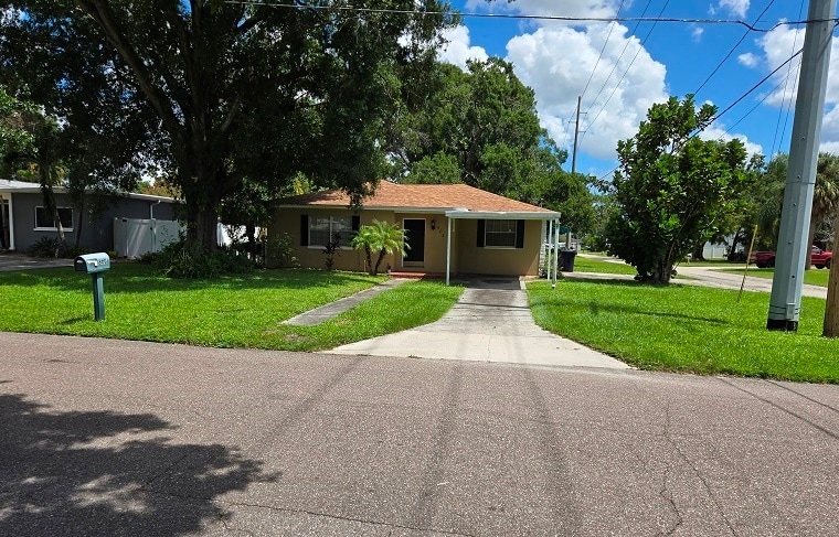 Home has a carport for your car - 803 N Gomez Ave