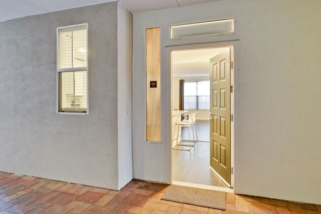 Building Photo - Modern Ground Floor Rivermark Condo with Patio Resort Style Amenities and Secure Parking