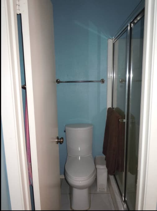 Attached bath in main bedroom has a shower. Upstairs bath has tub/shower. - 6806 Thorncliffe Dr