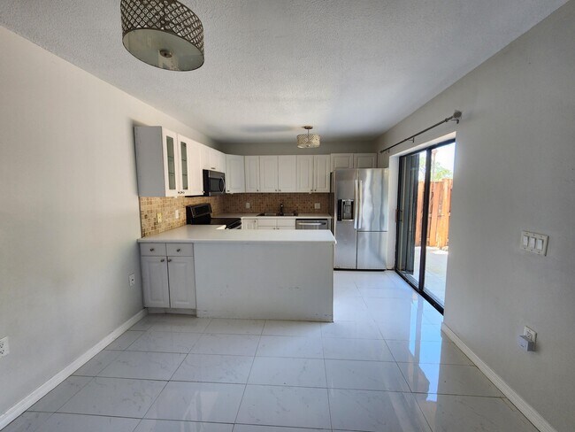 Foto del edificio - 5768 SE Windsong Ln