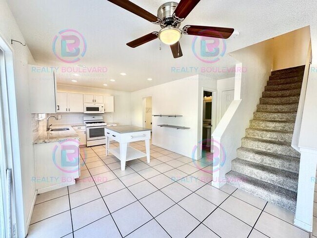 Building Photo - Gorgeous 4BR Home with Granite Counters, Open-Concept Living & 2 car garage