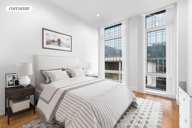 Building Photo - 21-59 44th Drive 2C