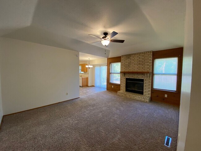 Building Photo - Three bedroom, two bathroom, two car garag...