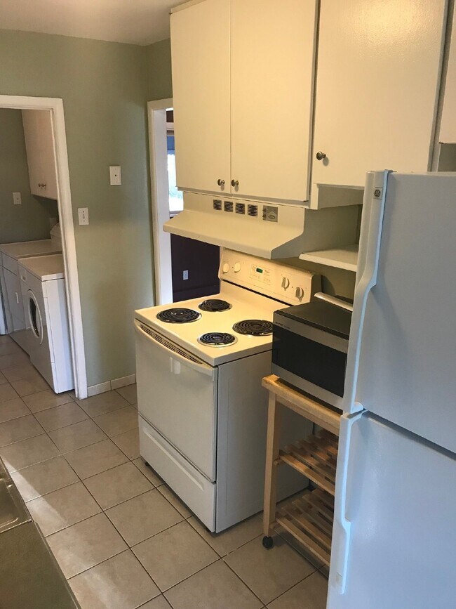 Building Photo - 2BR/1BA in University Hills with Huge Yard...