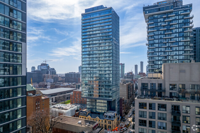 Building Photo - The Garden District Condos