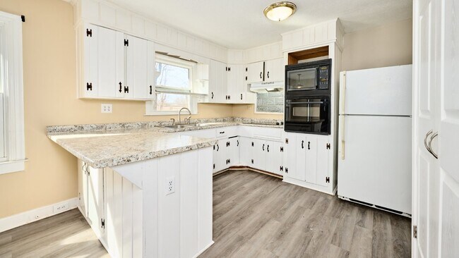 Building Photo - For Rent: 4 BR, 2 BA home (Application pen...