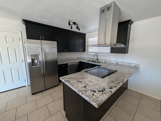 Foto del edificio - 5607 W Meadowbrook Ave
