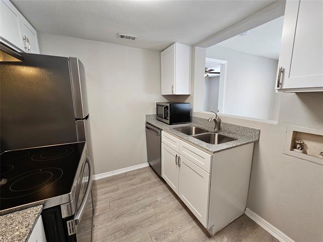 Foto del edificio - 7431 Holly Hill Dr