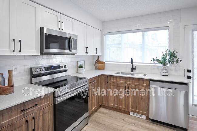 Photo du bâtiment - 1203-1163 163 St SW