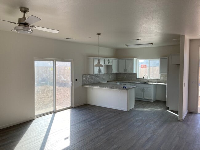 Front room, kitchen - 3928 S Burke St