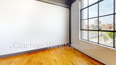 Building Photo - 101 E 6th St