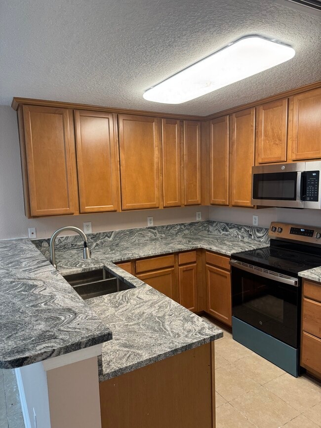 All new stainless appliances (plastic still on) - 1034 N Black Cherry Dr