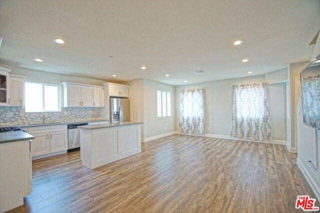 Building Photo - 4712 W Maplewood Ave