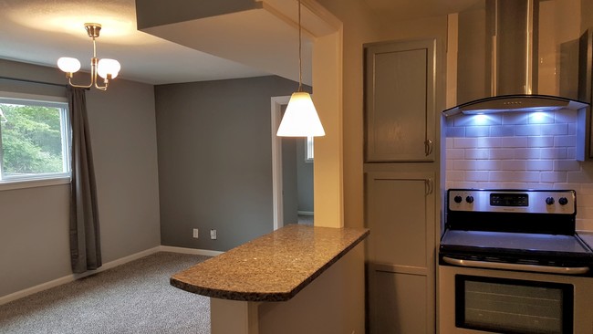 Kitchen and Living room - Mission Park Apartments