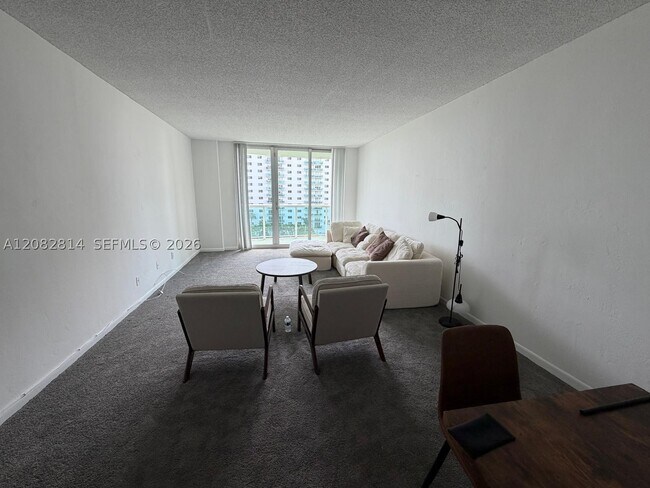 Building Photo - 19380 Collins Ave