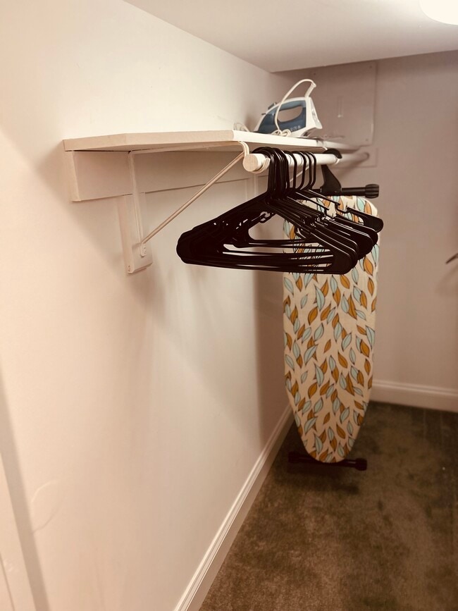 Walk in closet equipped with iron and board! - 10502 Big Horn Dr