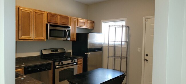 Foto del edificio - 4823 S Langley Ave