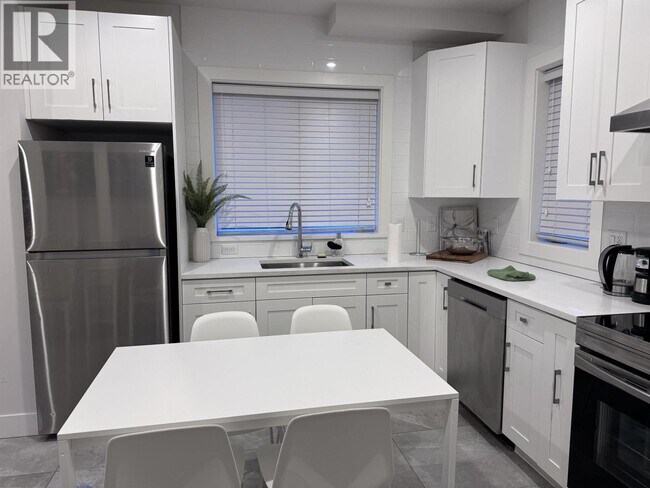 Photo du bâtiment - 78 E 51st Ave