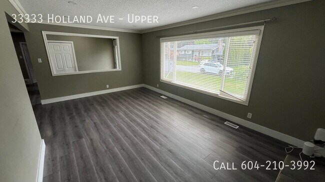 Photo du bâtiment - Charming 3 Bedroom Upper