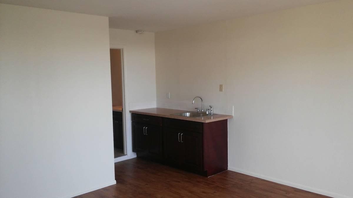 Refrigerator has been installed next to sink. - 2277 Aumakua St