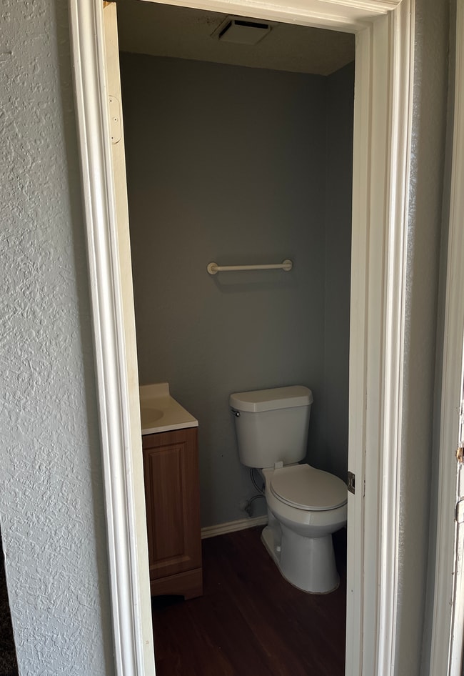 First floor powder room near stairs - 926 Chisholm Cv