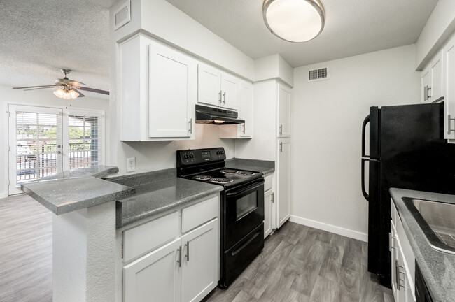 White Shaker Cabinets with Modern Hardware - Kitchen - Ruby Interior - Azul Apartments