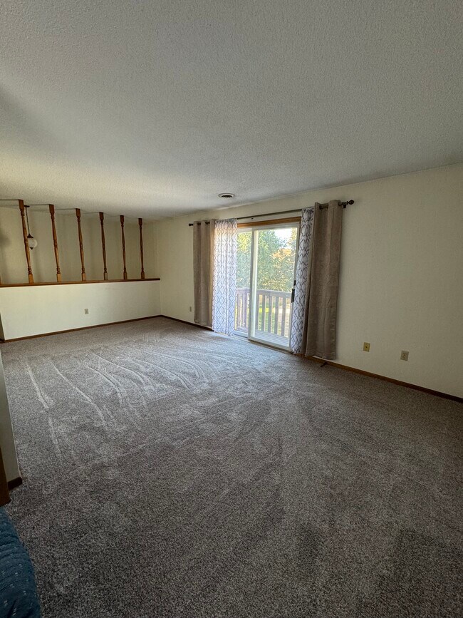 Living room w/ balcony - 287 Orrin St