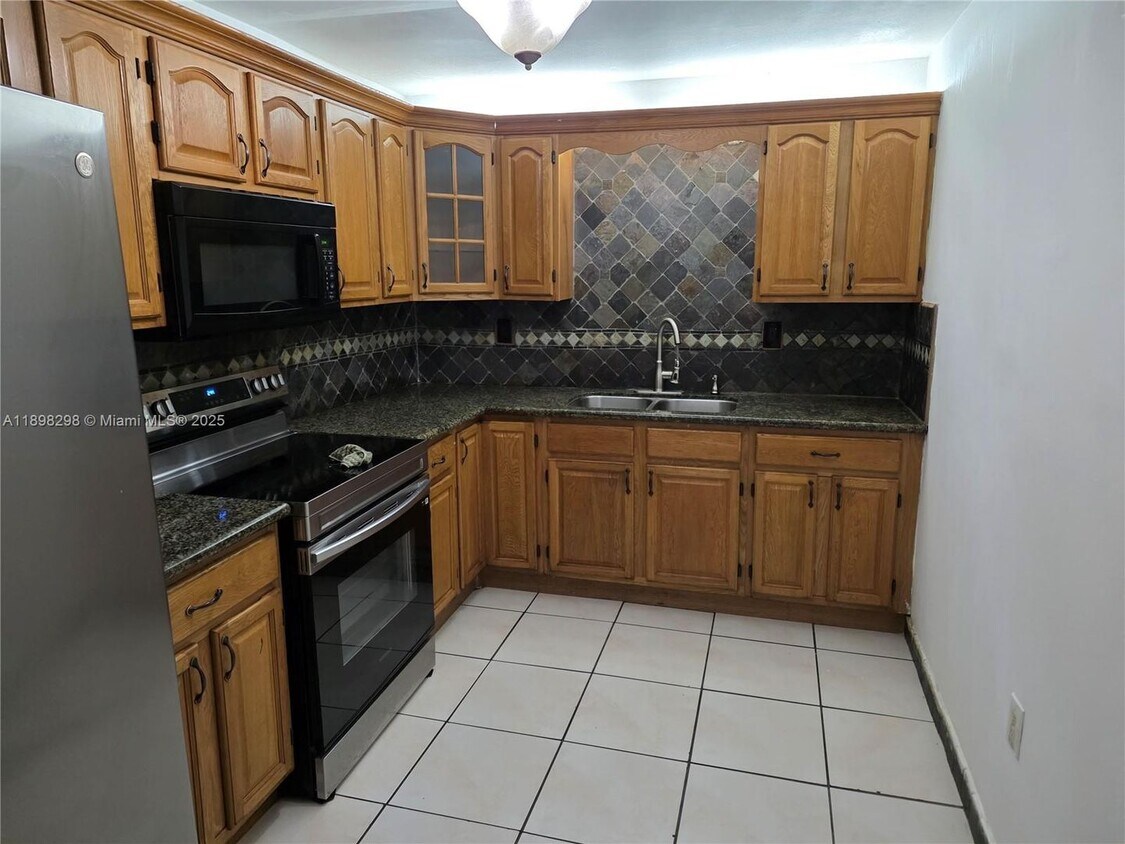 Photo - 10000 NW 80th Court 2301, Hialeah Gardens, FL 33016