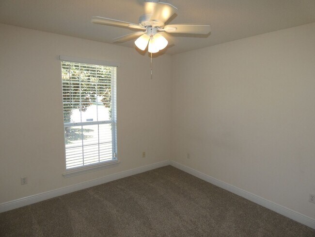 Building Photo - Charming 4-Bedroom Home With Sunroom