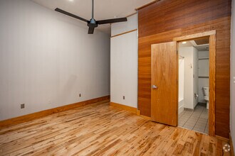 2BR, 1BA - 1,479SF - Unit 207 - Primary Bedroom - Emporium Lofts