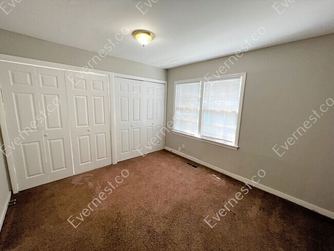 Building Photo - 8216 Rugby Ave