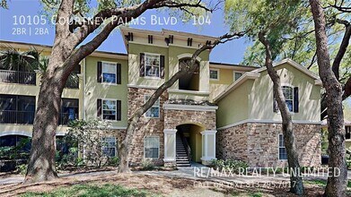 Building Photo - 10105 Courtney Palms Blvd