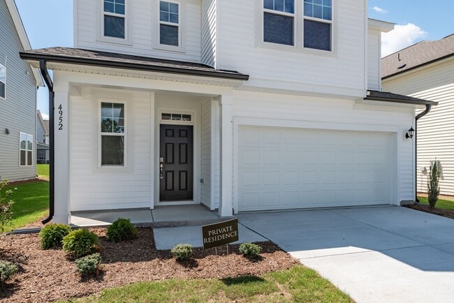 Building Photo - AVAILABLE NOW! Pet-Friendly New Constructi...
