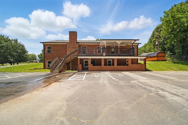 Parking area and rear of building - 216 Legion Dr