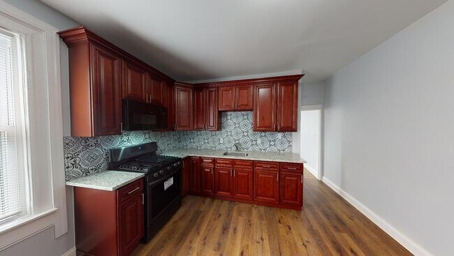 Foto del edificio - 706 E 43rd St