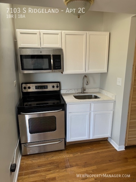 Primary Photo - 1 Bed+ with Quartz, Updated Bath, Hardwood...