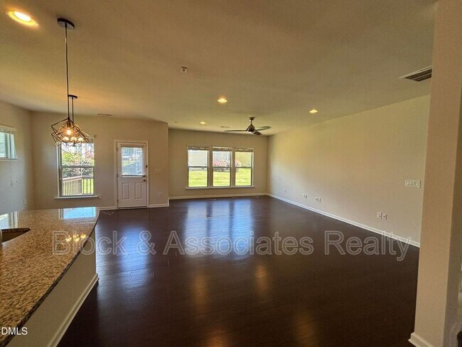 Building Photo - 1009 Magnolia Blossom Ln