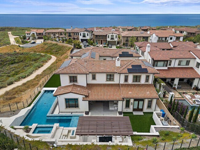 Building Photo - Exquisite coastal estate showcasing stunni...