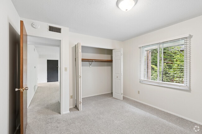 2BR, 1BA - 875SF - Primary Bedroom - Montmartre Apartments