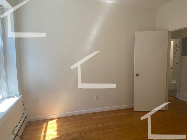 Building Photo - Ridiculous renovation in the living room including 'metal object'