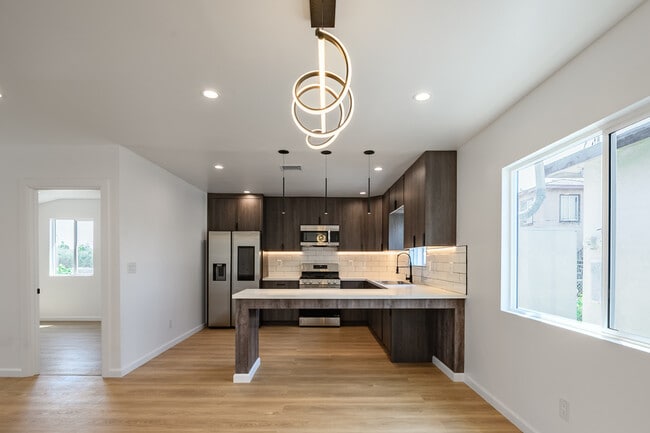 Building Photo - 6557 Darwell Ave