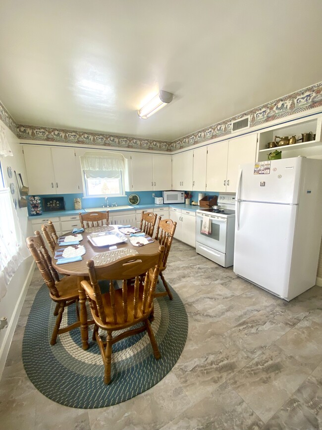 Charming kitchen with a laundry shoot in the cabinet! - 141 N 1st E